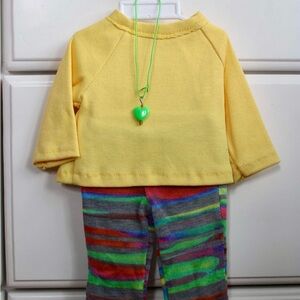Yellow Long Sleeve Top with Colorful Pants